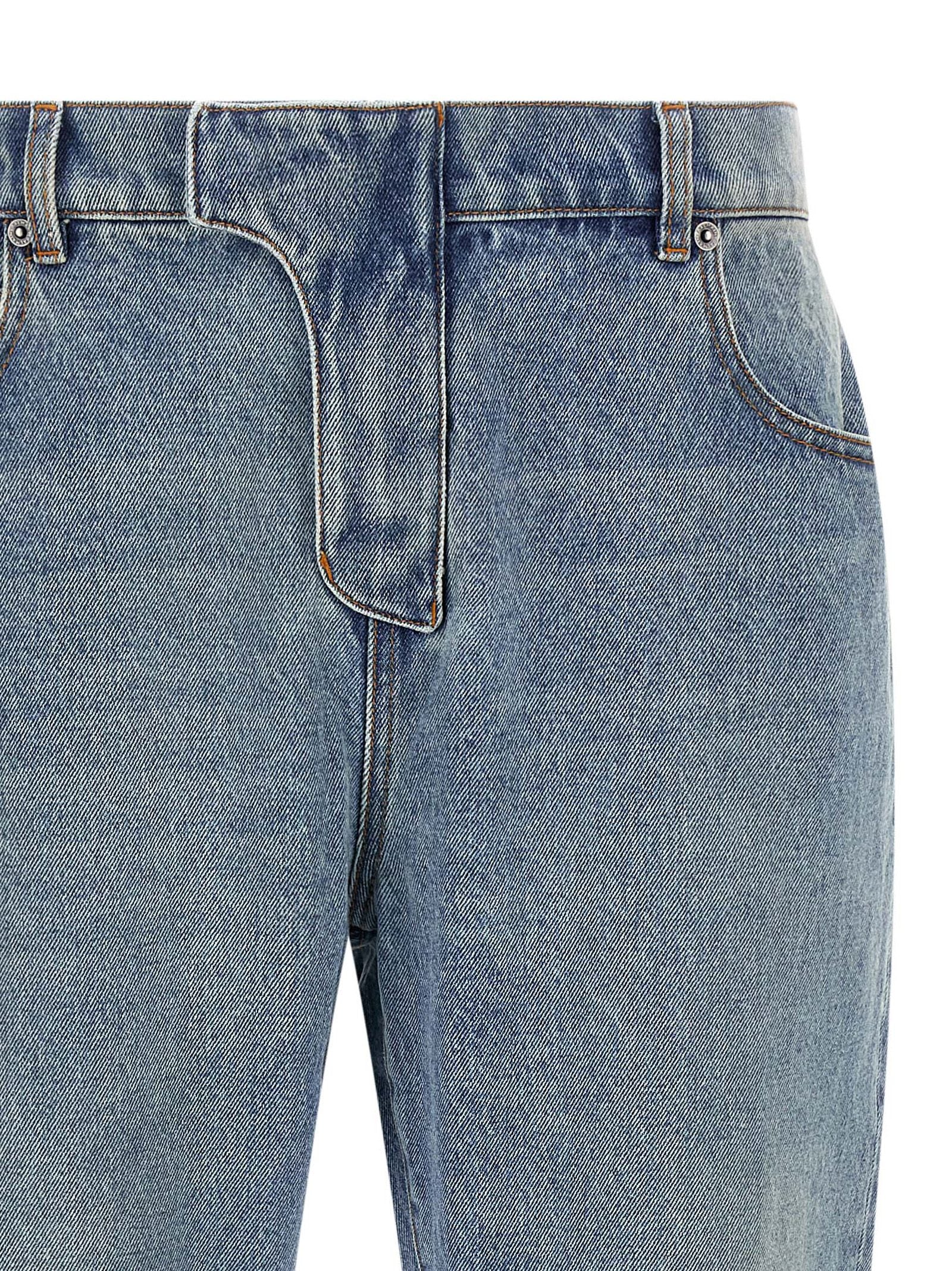 Jeans by Balmain for men in denim cotton blue & signature presents a refined pantology silhouette, artfully defined by a refined pantology straight-leg, long, and a sophisticated .