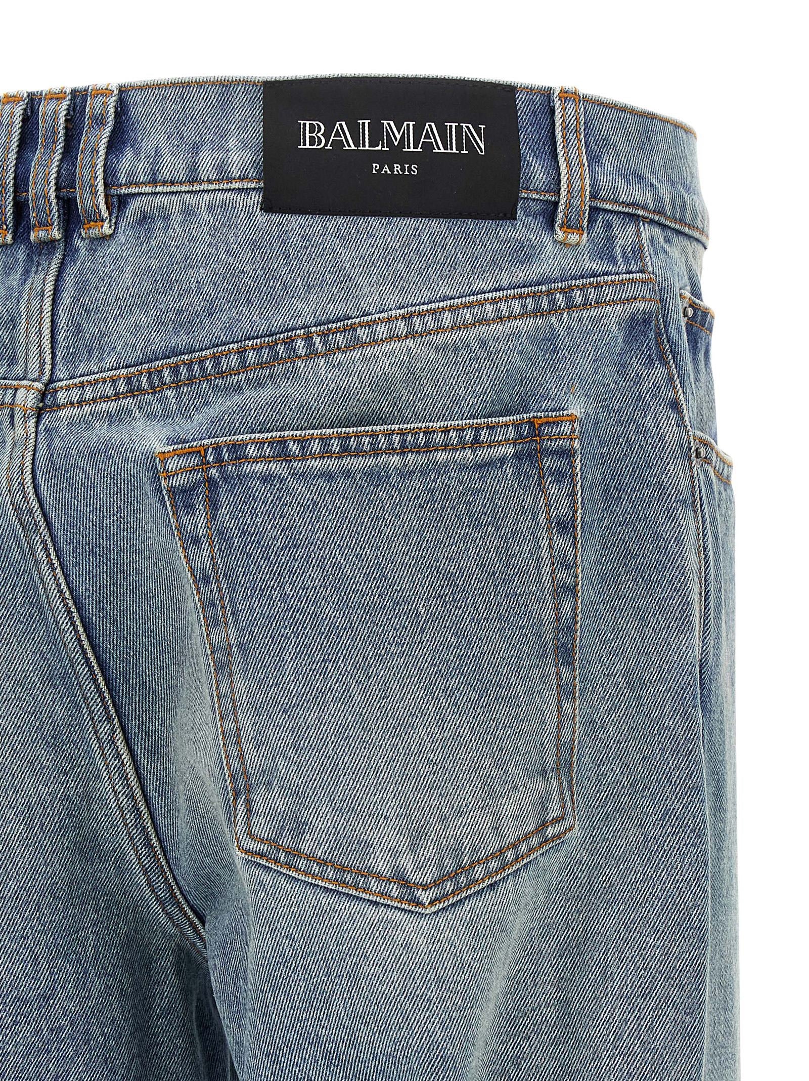 Jeans by Balmain for men in denim cotton blue & signature features a refined silhouette with a refined straight-leg, defined by a and a refined long for a refined finish.