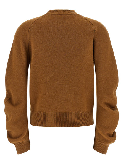 Cardigan by NUDE for women in virgin wool brown & nude features an crisp silhouette, showcasing a sophisticated and detail for a truly crisp finish.