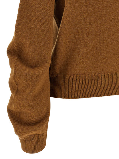 Cardigan by NUDE for women in virgin wool brown & nude showcases a captivating silhouette, artfully detailed with a captivating and for a truly sophisticated captivating look.