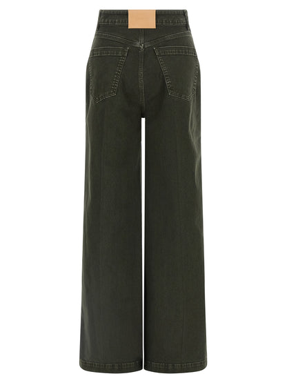 Jeans by NUDE for women in stretch denim cotton black, nude & signature presents a tailored silhouette, showcasing a tailored wide and long cut with a refined high rise for a truly tailored aesthetic.