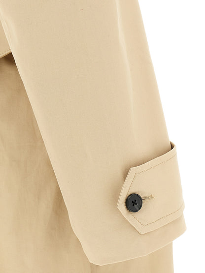 Trench Coat by Entire Studios for women in cotton canvas beige presents a distinguished silhouette, artfully detailed with and a distinguished for a sophisticated, distinguished finish.