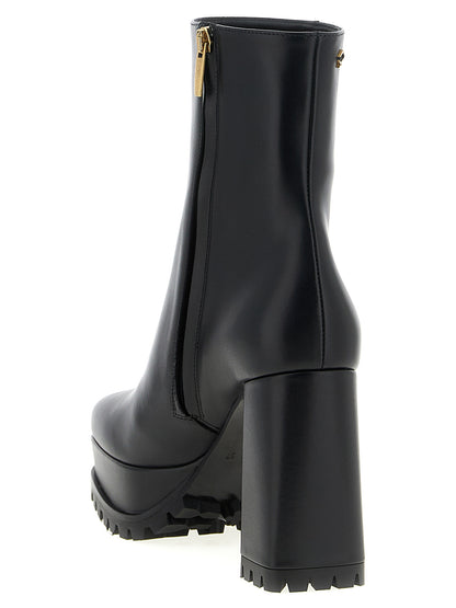 Platform Ankle Boots by Gianvito Rossi for women in calfskin leather black features an high-performance silhouette, showcasing the sophisticated design of the Ribbon Women's Calfskin Leather Platform Ankle Boots with a platform and a refined square toe style.