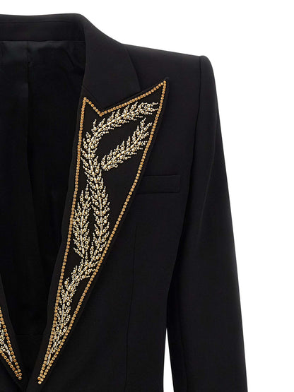 Blazer by Balmain for men in viscose satin black presents a distinguished silhouette, detailed with a distinguished and distinctive for a truly sophisticated finish.