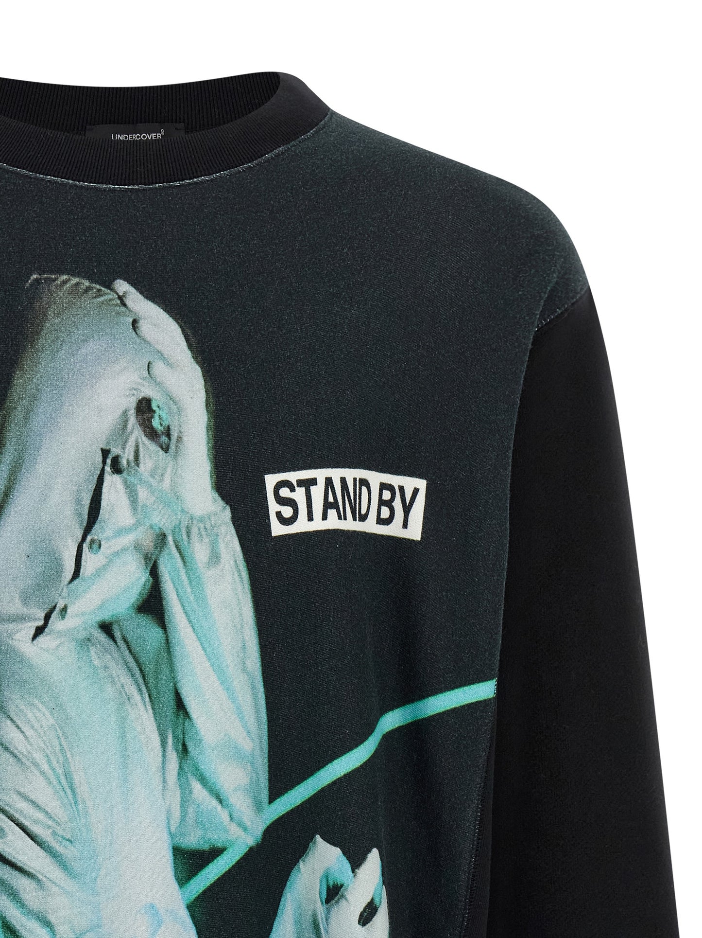 Sweatshirt by Undercover for men in cotton black & print showcases a slouchy chic silhouette, artfully detailed with a slouchy chic round neckline and for a slouchy chic finish.