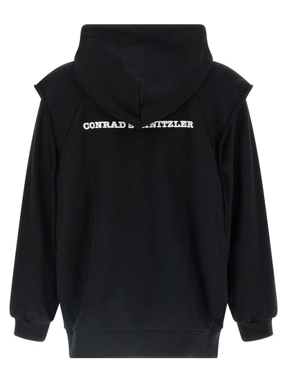 Sweatshirt Hoodie by Undercover for men in cotton black & print features a slouchy chic silhouette, detailed with a slouchy chic and a signature hooded neckline for an elevated aesthetic.