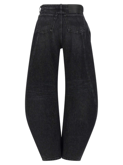 Jeans by Jean Paul Gaultier for women in cotton denim black presents a tailored silhouette, showcasing a tailored wide and long cut with a refined low rise for a truly tailored aesthetic.