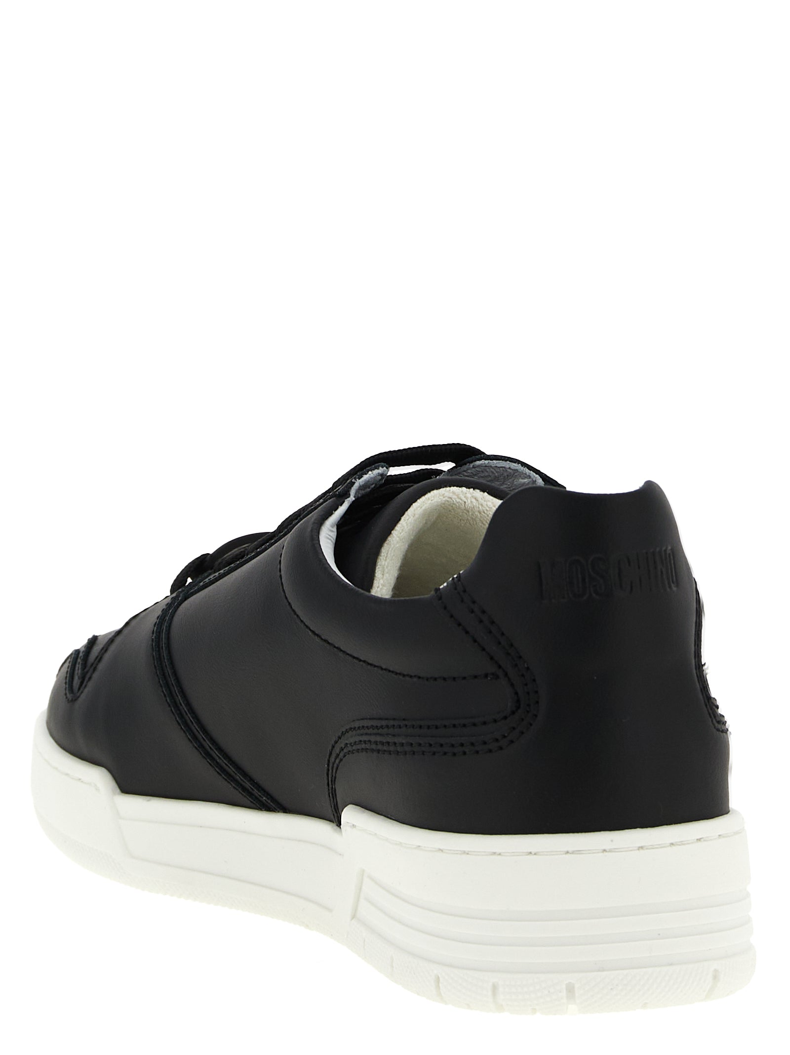 Sneakers by Moschino for men in leather & rubber black presents a sumptuous silhouette, artfully capturing the essence of the City Men's Low Top Leather & Rubber Sneakers with its sumptuous low-top style design.