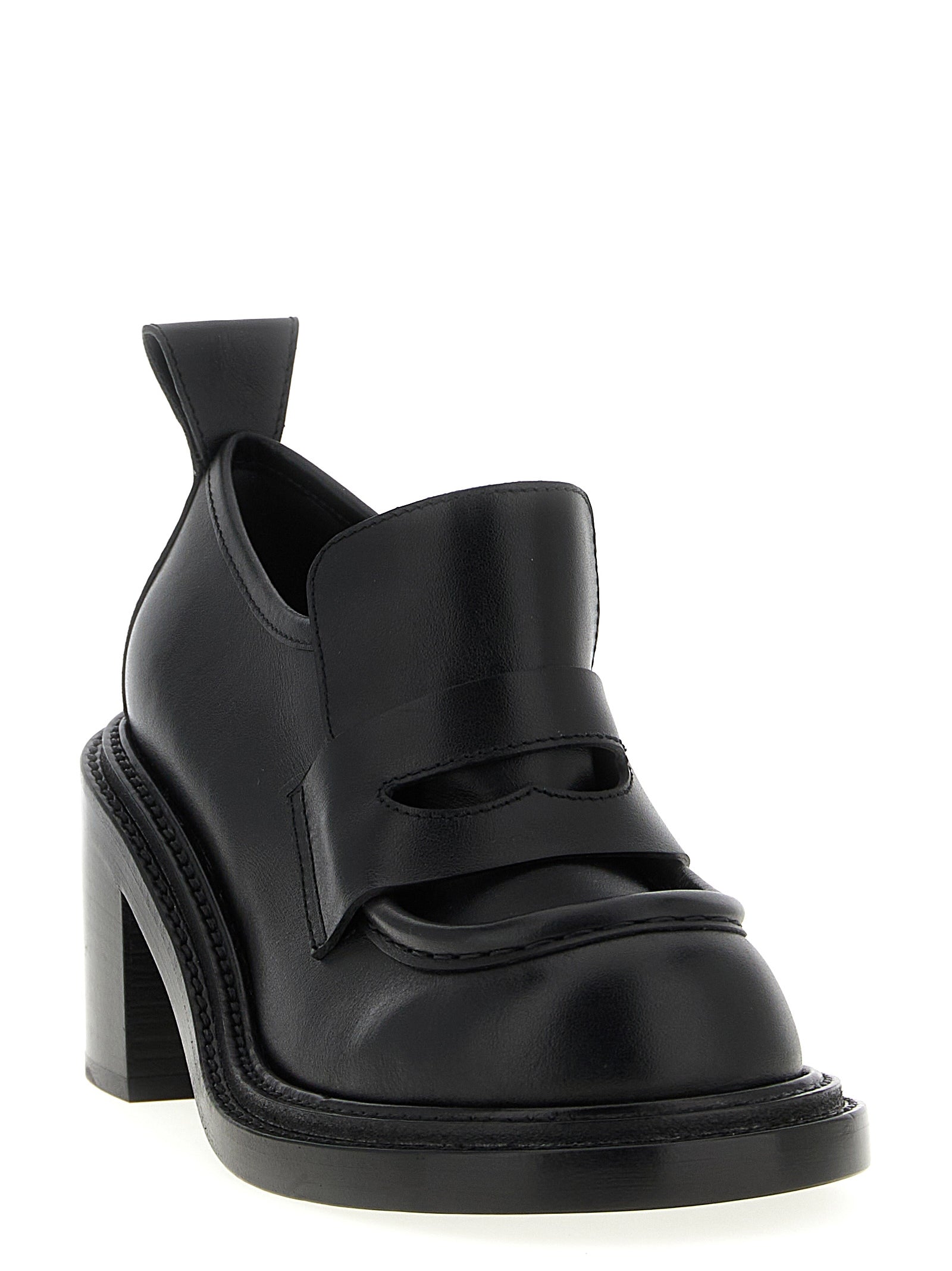 This Platform Geometric Loafer Work Shoes by Moschino for women in calfskin leather black features an exquisite silhouette from the College Olivia Play Women's Calfskin Leather Platform Geometric Loafer Work Shoes collection, defined by a sophisticated platform geometric-heel and elegant .