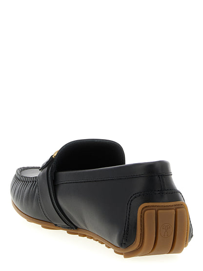 Loafer Slip-On Shoes by Moschino for men in leather & rubber black features an ergonomic silhouette, perfectly showcasing Men's Leather & Rubber Loafer Slip-On Shoes with its distinct and elegant .