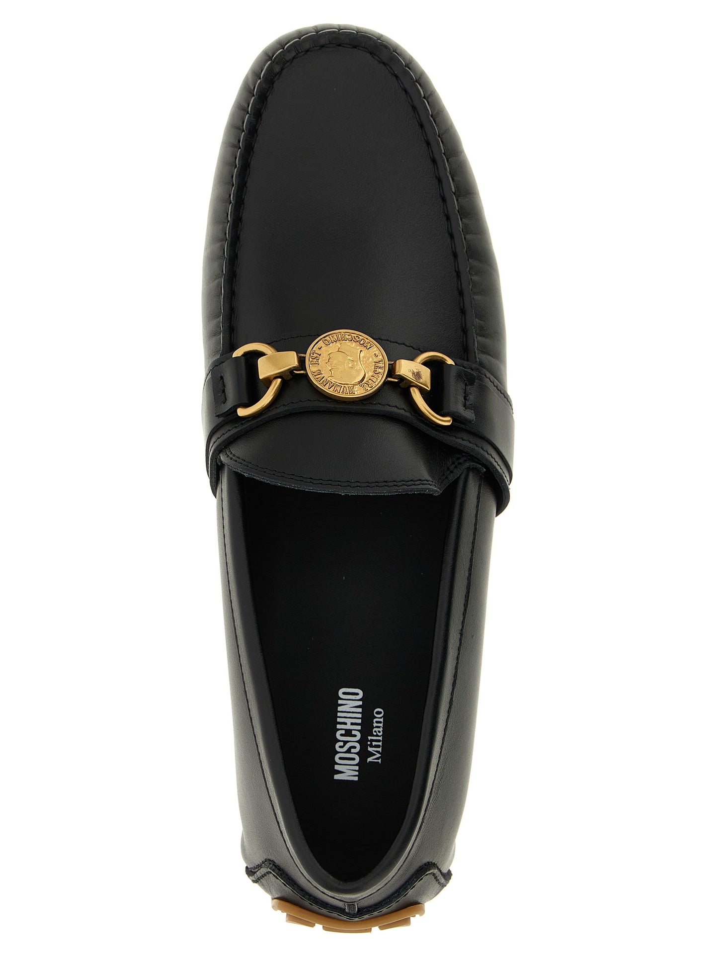 This Loafer Slip-On Shoes by Moschino for men in leather & rubber black features an exquisite silhouette from the Men's Leather & Rubber Loafer Slip-On Shoes collection, defined by a sophisticated and elegant .