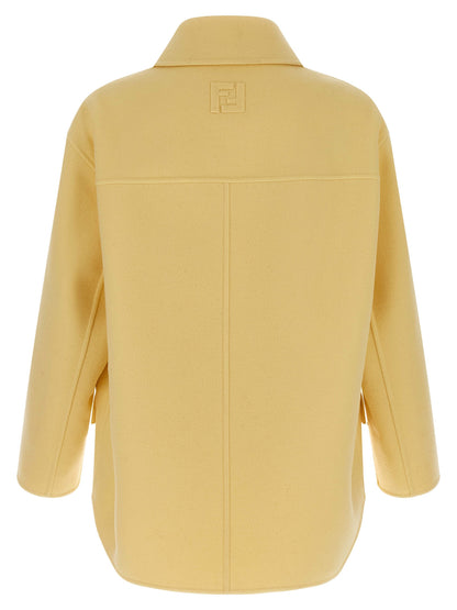 Overcoat by Fendi for men in virgin wool bicolour & yellow showcases a enveloping silhouette, detailed with distinctive pockets and a enveloping shirt-collar neckline.
