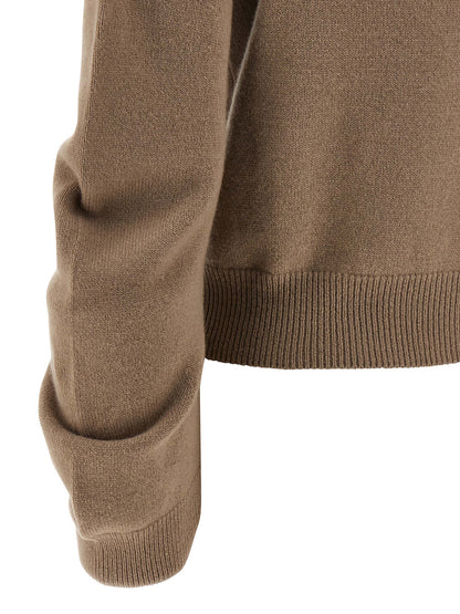 Cardigan by NUDE for women in virgin wool beige & nude features an impeccable silhouette, showcasing a sophisticated and detail for a truly impeccable finish.