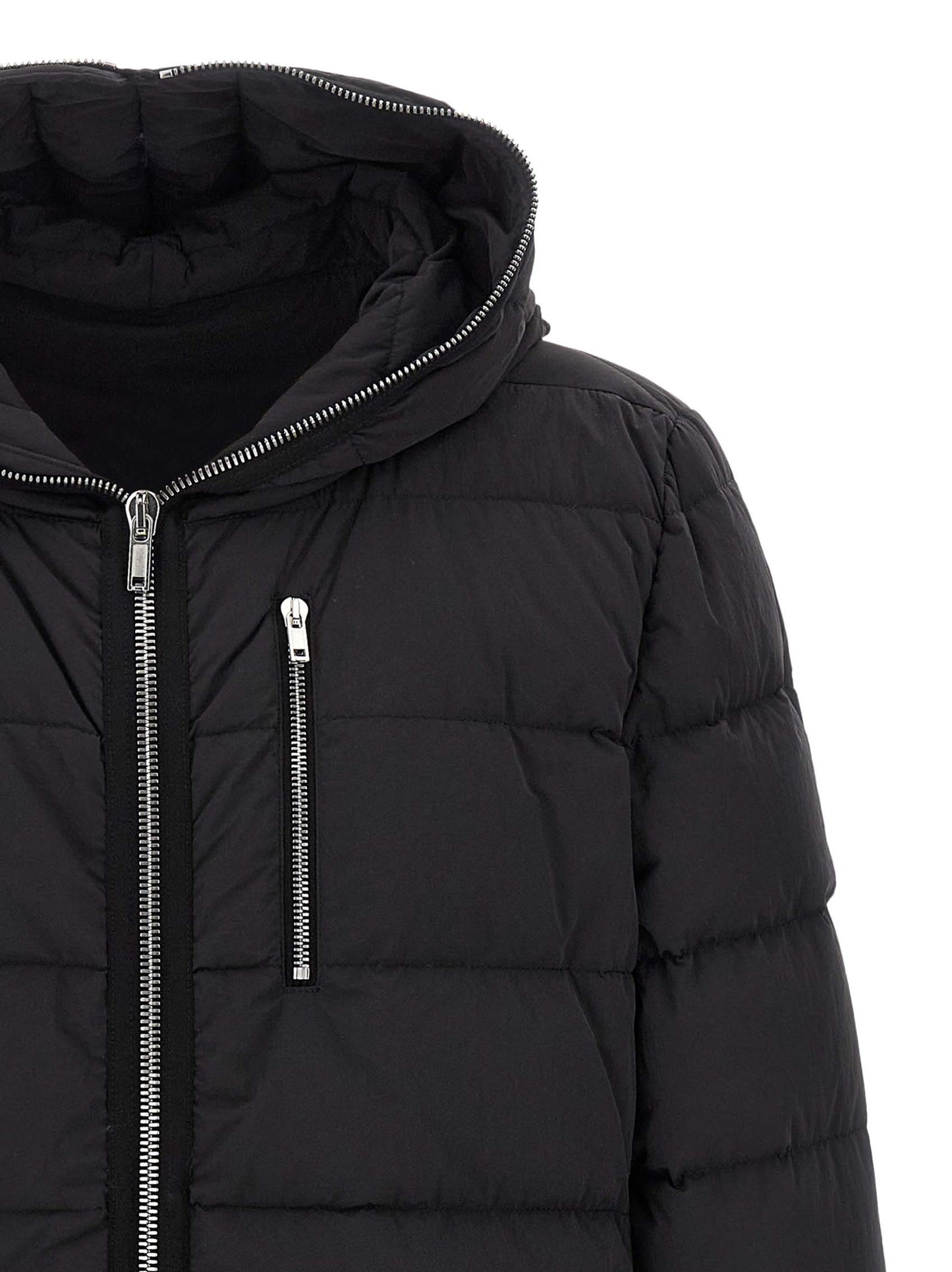 Hooded Puffer Jacket by Rick Owens for men in nylon & goose-down black presents a effortlessly chic silhouette, showcasing a sophisticated hooded neckline and premium lightweight, pockets, hooded & insulated for a truly effortlessly chic finish.