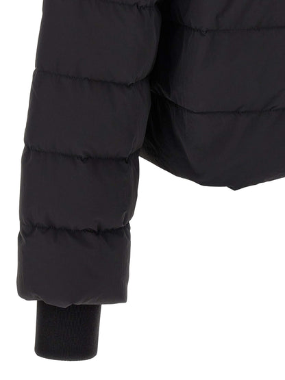 Hooded Puffer Jacket by Rick Owens for men in nylon & goose-down black features an contemporary silhouette, showcasing a sophisticated and contemporary lightweight, pockets, hooded & insulated for a truly refined look.