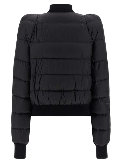 Bomber Jacket by Rick Owens for women in nylon & goose-down black showcases a bohemian silhouette, artfully detailed with a bohemian high-neck neckline and signature insulated for a truly bohemian finish.