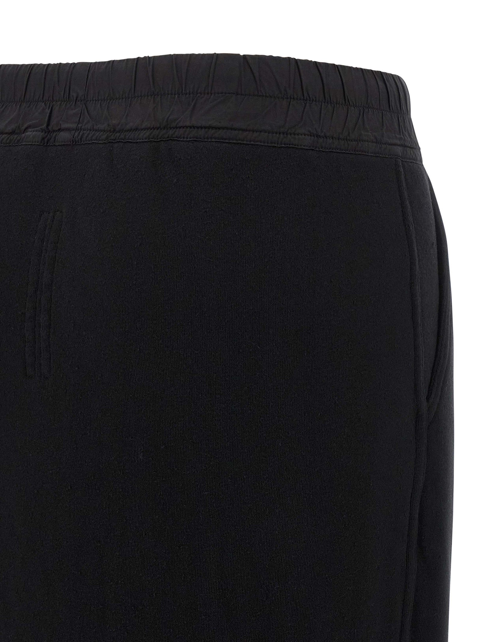 Skirt by DRKSHDW for women in cotton black showcases a sultry silhouette, elegantly defined by its mini and the sophisticated sultry design of the Women's Cotton Mini Skirt.