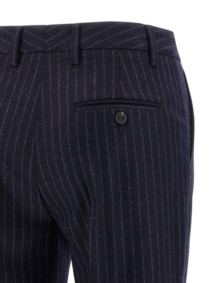 Trousers by Alberto Biani for women in virgin wool blue & pinstripe presents a perennial silhouette, meticulously tailored with a straight-leg cut, long finish, and an elegant .