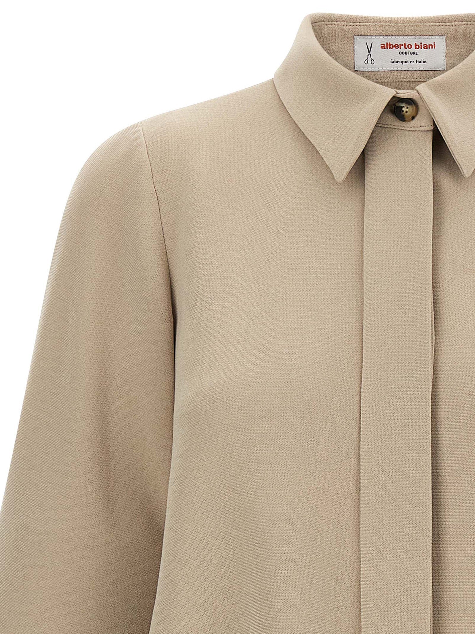 Blouse by Alberto Biani for women in polyester beige presents a discerning silhouette, showcasing a sophisticated asymmetric neckline and for a truly discerning finish.