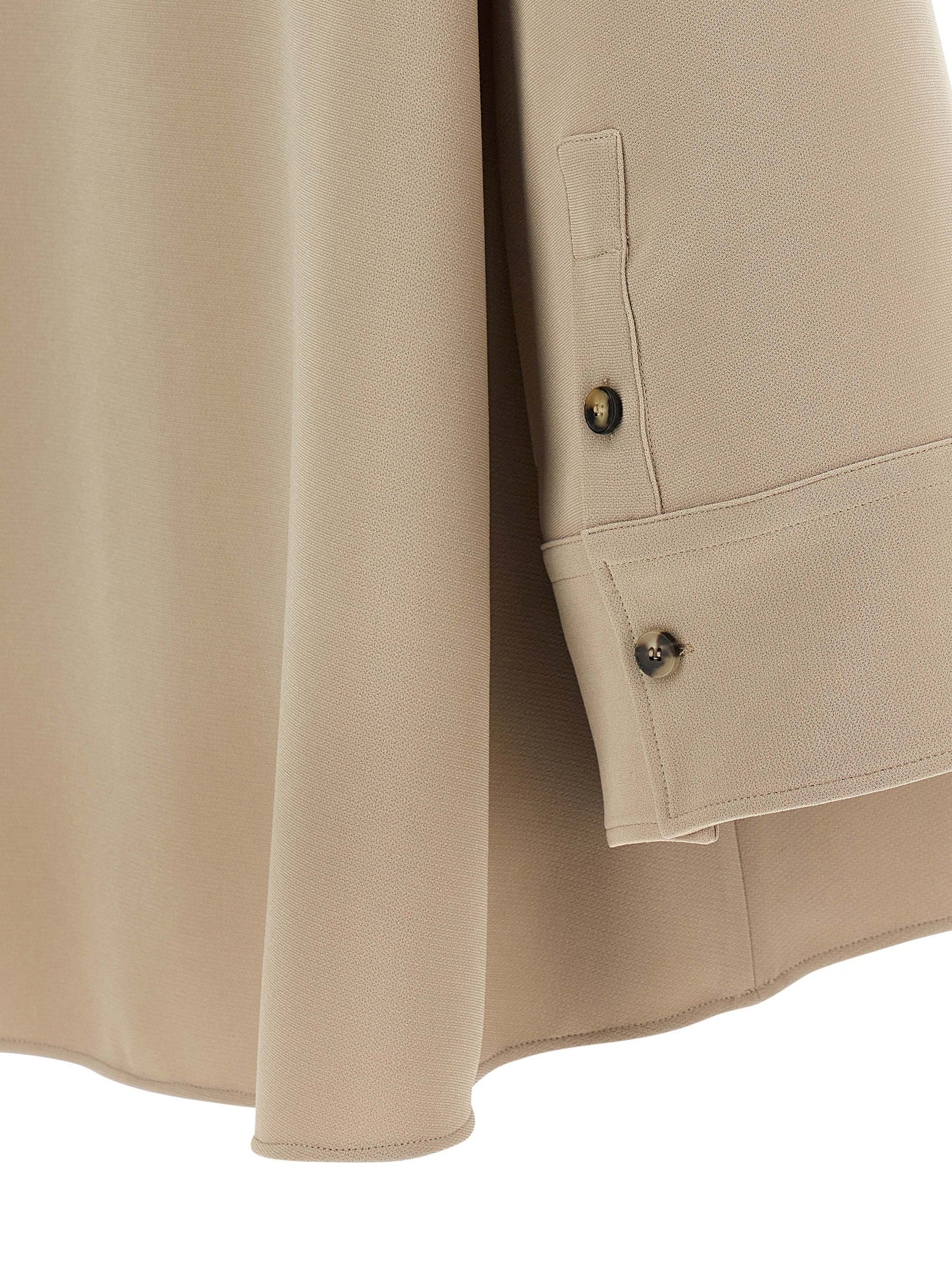 Blouse by Alberto Biani for women in polyester beige showcases a sharp silhouette, elegantly detailed with a sharp and sharp .