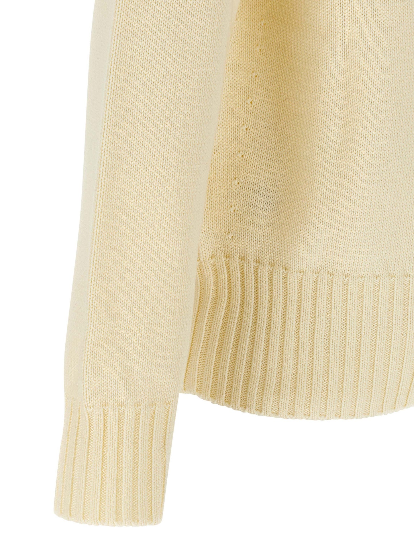 Cardigan by Givenchy for men in cotton beige showcases a captivating silhouette, artfully detailed with a captivating and for a truly sophisticated captivating look.