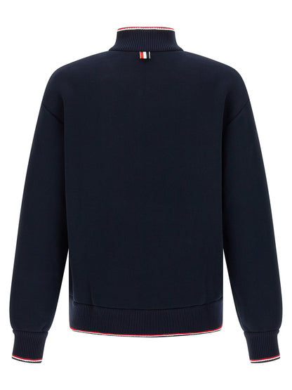 Sweatshirt by Thom Browne for men in polyamide cotton blue presents a smart casual silhouette, featuring a smart casual high-neck neckline and for a sophisticated look.