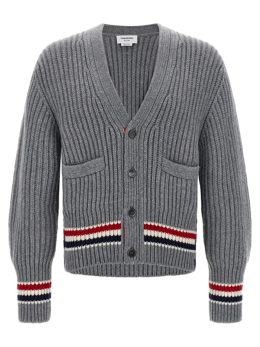 Cardigan by Thom Browne for men in cashmere gray features a dramatic silhouette, showcasing a sophisticated v-neck neckline and dramatic detail for a timeless, premium look.