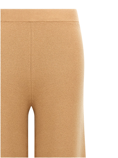 Trousers by Max Mara for women in cashmere wool brown features an sartorial silhouette, showcasing a precise flared & wide and long with a sartorial for a refined look.