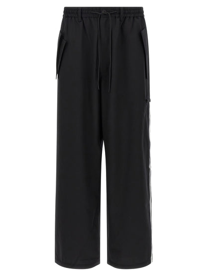 Casual Pants by Y-3 for men in polyester wool black presents a refined pantology silhouette, artfully defined by a refined pantology straight-leg, long, and a sophisticated .