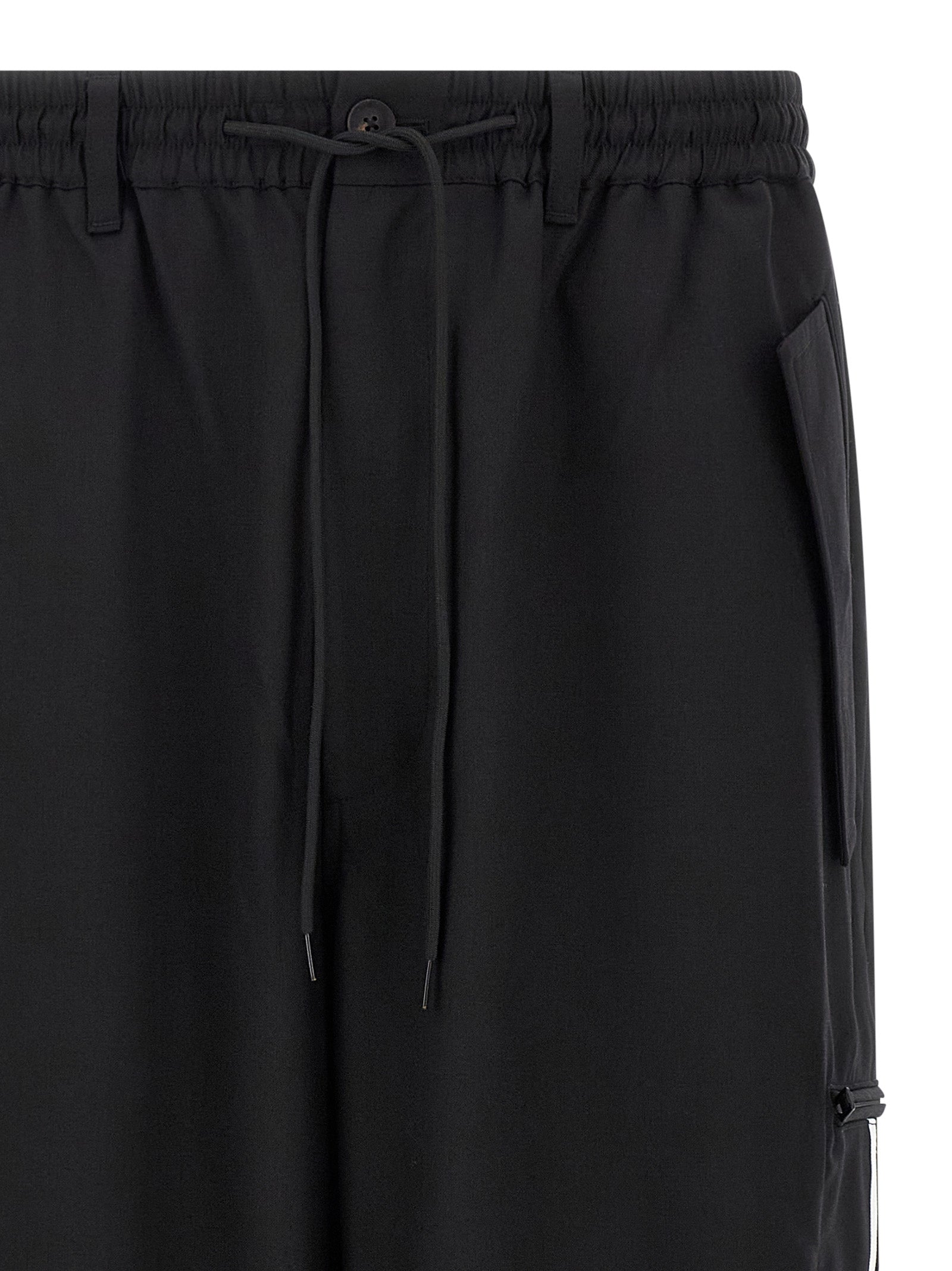 Casual Pants by Y-3 for men in polyester wool black features a polished silhouette with a polished straight-leg, reaching a polished long and finished with a polished .