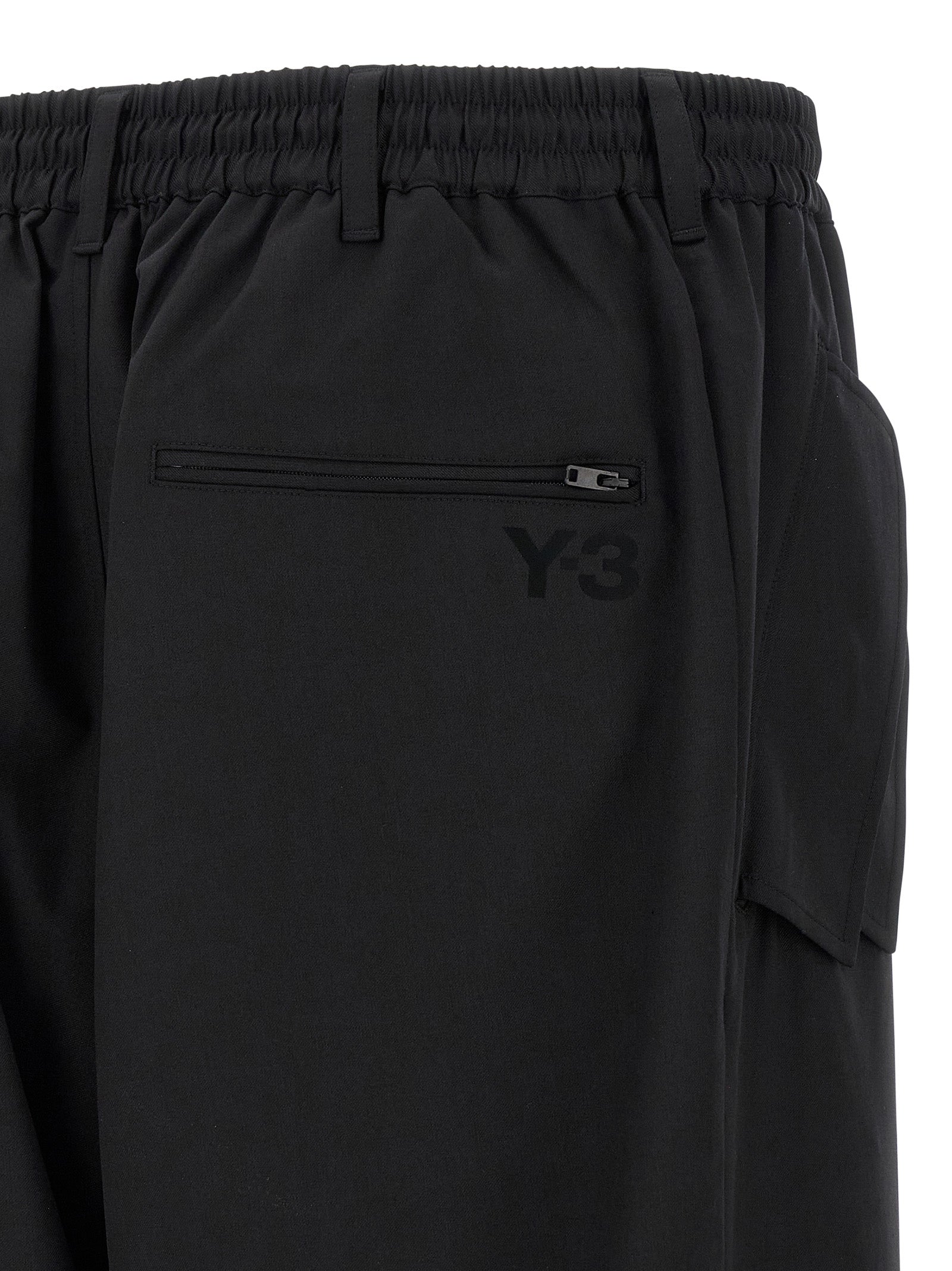 Casual Pants by Y-3 for men in polyester wool black presents a refined pantology silhouette, artfully defined by a refined pantology straight-leg, long, and a sophisticated .