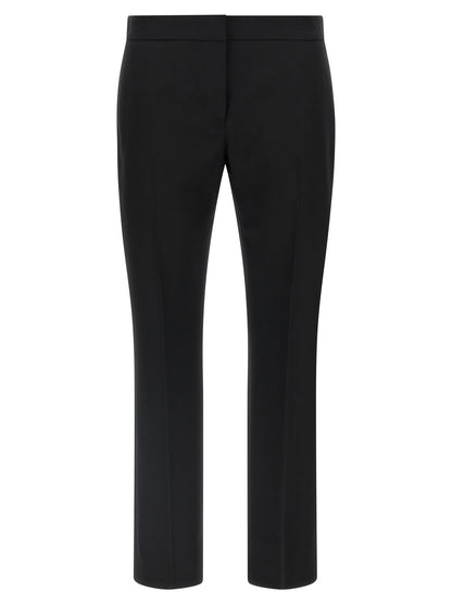 Trousers by Alexander McQueen for women in wool black features an sartorial silhouette, showcasing a precise straight-leg & cigarette and long with a sartorial for a refined look.