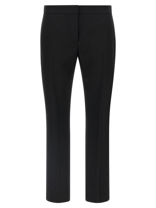 Trousers by Alexander McQueen for women in wool black features an sartorial silhouette, showcasing a precise straight-leg & cigarette and long with a sartorial for a refined look.