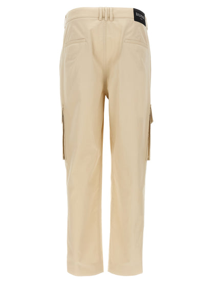 Cargo Pants by Balmain for men in cotton beige & signature features a architectural straight-leg with a architectural long and architectural .