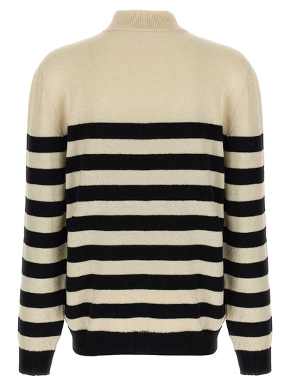 Cardigan by Balmain for men in cashmere bicolour, black, white & striped showcases a captivating silhouette, artfully detailed with a captivating and high-neck neckline for a truly sophisticated captivating look.