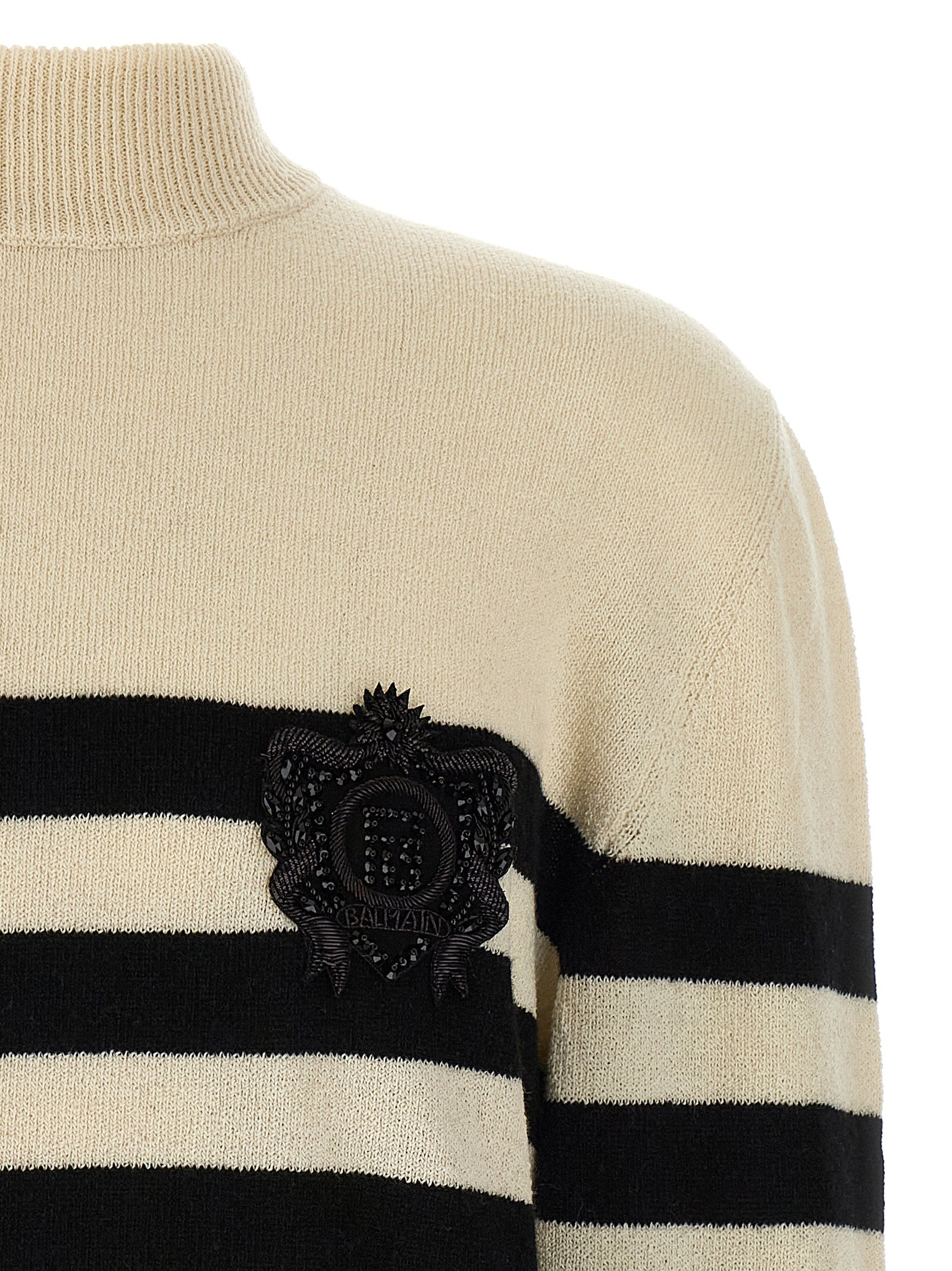 Cardigan by Balmain for men in cashmere bicolour, black, white & striped features an crisp silhouette, showcasing a sophisticated high-neck neckline and detail for a truly crisp finish.