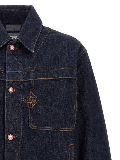 This Trucker Jacket by Casablanca for men in denim cotton blue & signature exhibits a edgy silhouette, meticulously detailed with functional pockets and a edgy for a edgy finish.