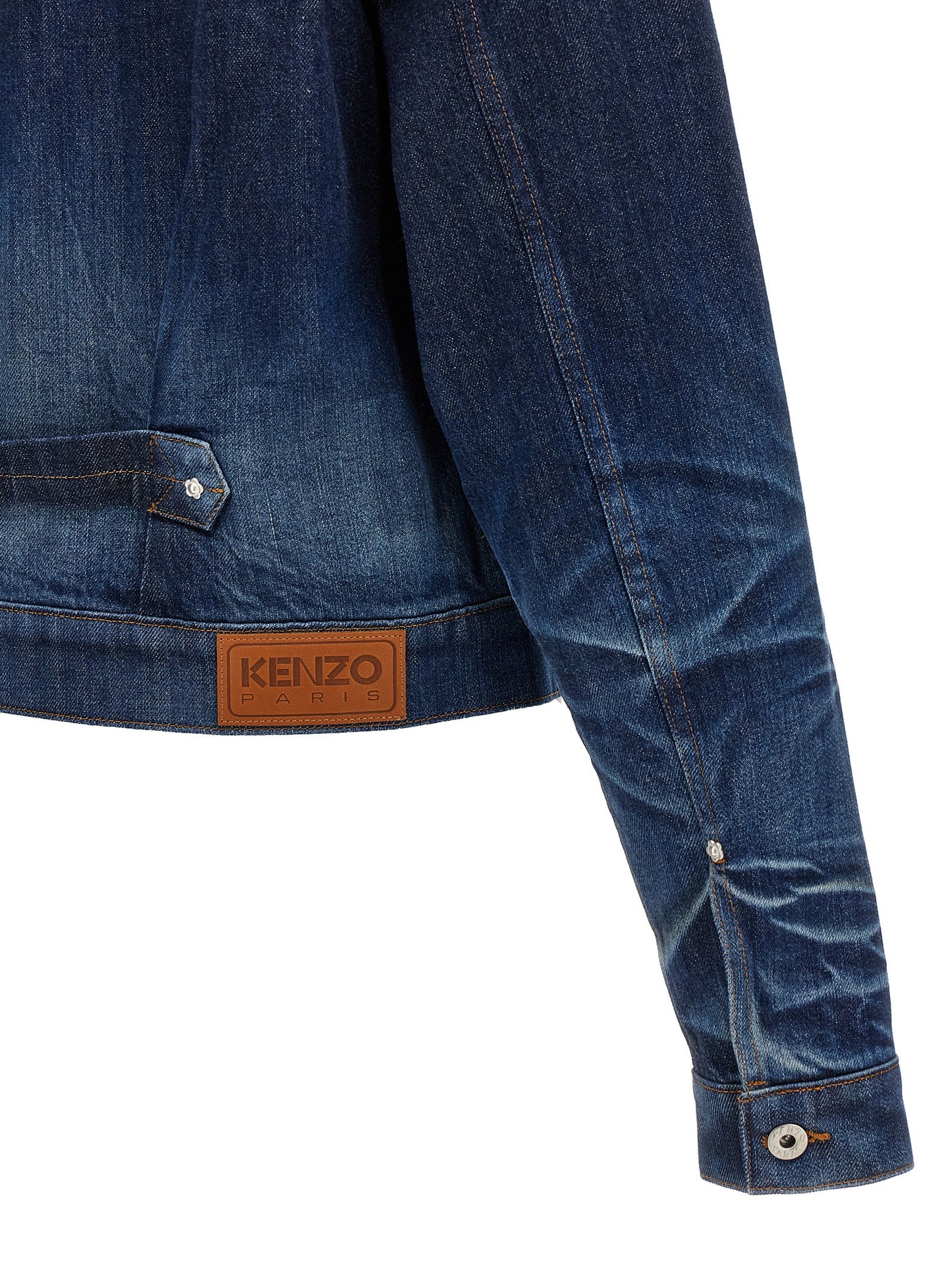 Trucker Jacket by Kenzo for men in cotton denim blue showcases a bohemian silhouette, artfully detailed with a bohemian and signature pockets for a truly bohemian finish.