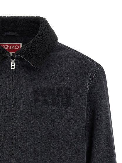 This Trucker Jacket by Kenzo for men in stretch denim cotton black exhibits a edgy silhouette, meticulously detailed with functional pockets and a edgy for a edgy finish.