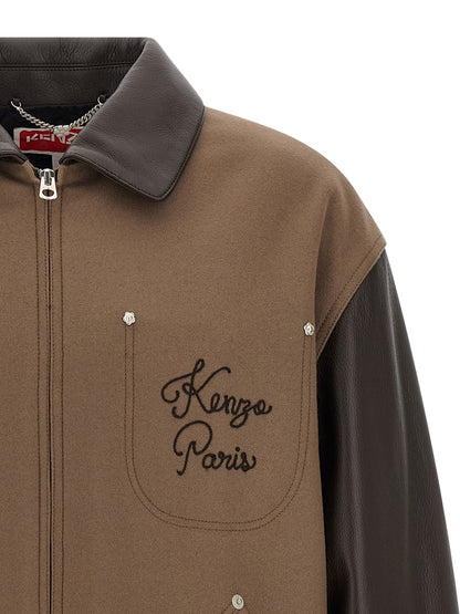 Jacket by Kenzo for men in polyamide grained leather & virgin wool brown presents a authentic silhouette, artfully detailed with a authentic and functional pockets & insulated for a premium authentic finish.