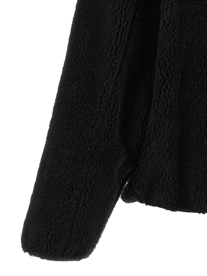 Sweatshirt Hoodie by Kenzo for men in polyester acrylic black features an dramatic silhouette, showcasing a sophisticated and dramatic for a refined, modern aesthetic.