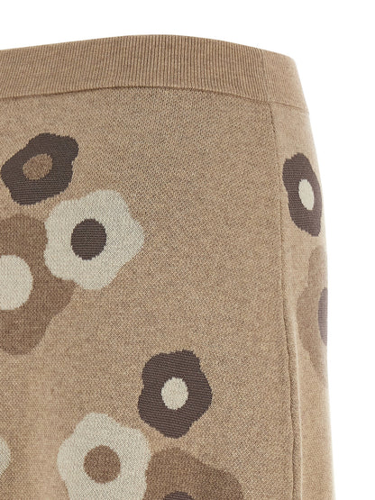 Skirt by Kenzo for women in wool cotton & viscose beige, dots & signature features a captivating silhouette, showcasing the captivating Women's Wool Cotton & Viscose Long Skirt design with a sophisticated long for a captivating look.