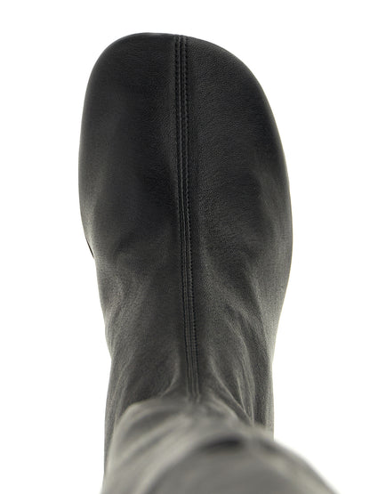 Over-The-Knee Boots by Jil Sander for women in nappa calf leather black features an avant-garde Women's Nappa Calf Leather Over-The-Knee Boots silhouette, defined by a sophisticated and a avant-garde .