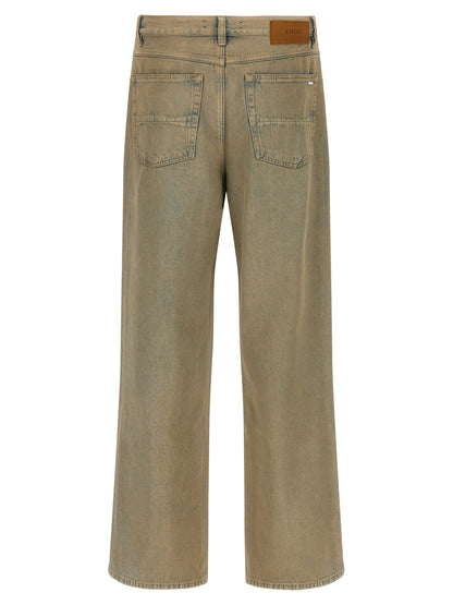 Jeans by Amiri for men in cotton denim beige presents a tailored silhouette, showcasing a tailored straight-leg & wide and long cut with a refined for a truly tailored aesthetic.