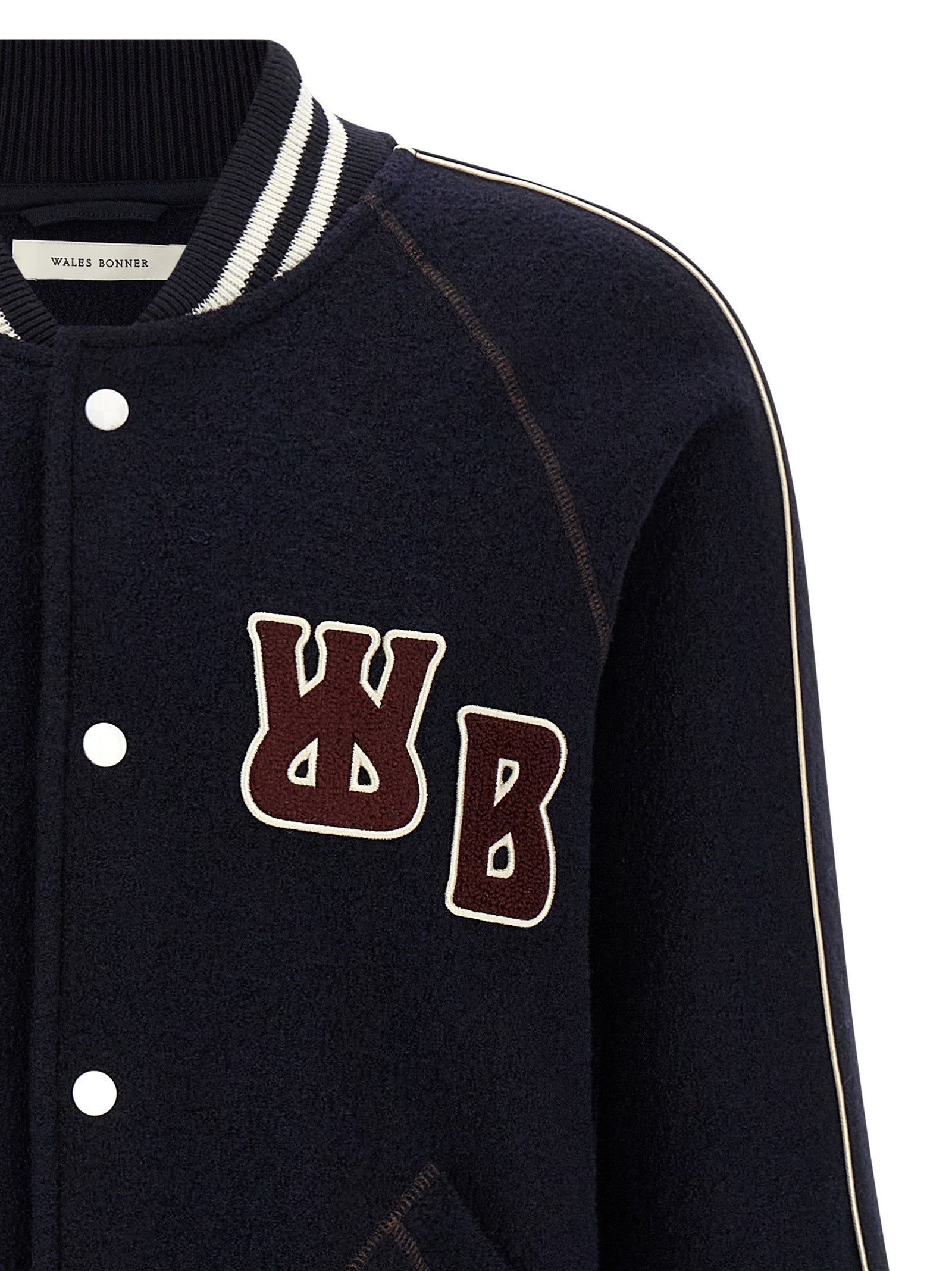 Bomber Jacket by WALES BONNER for men in virgin wool terrycloth blue features a dramatic silhouette, showcasing a sophisticated and distinctive lightweight & pockets for a dramatic aesthetic.