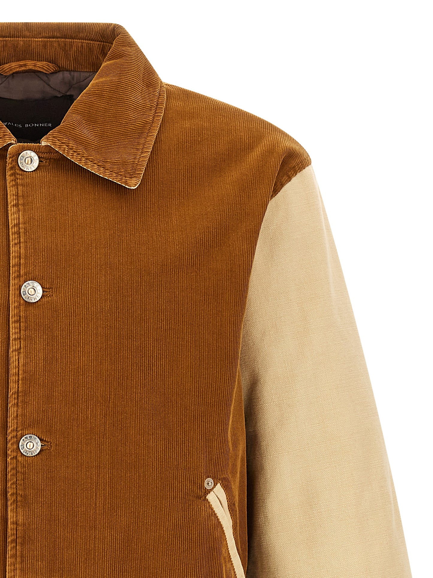 Bomber Jacket by WALES BONNER for men in cotton corduroy brown features a city-ready silhouette, detailed with pockets & insulated and a city-ready wrap shirt-collar neckline.
