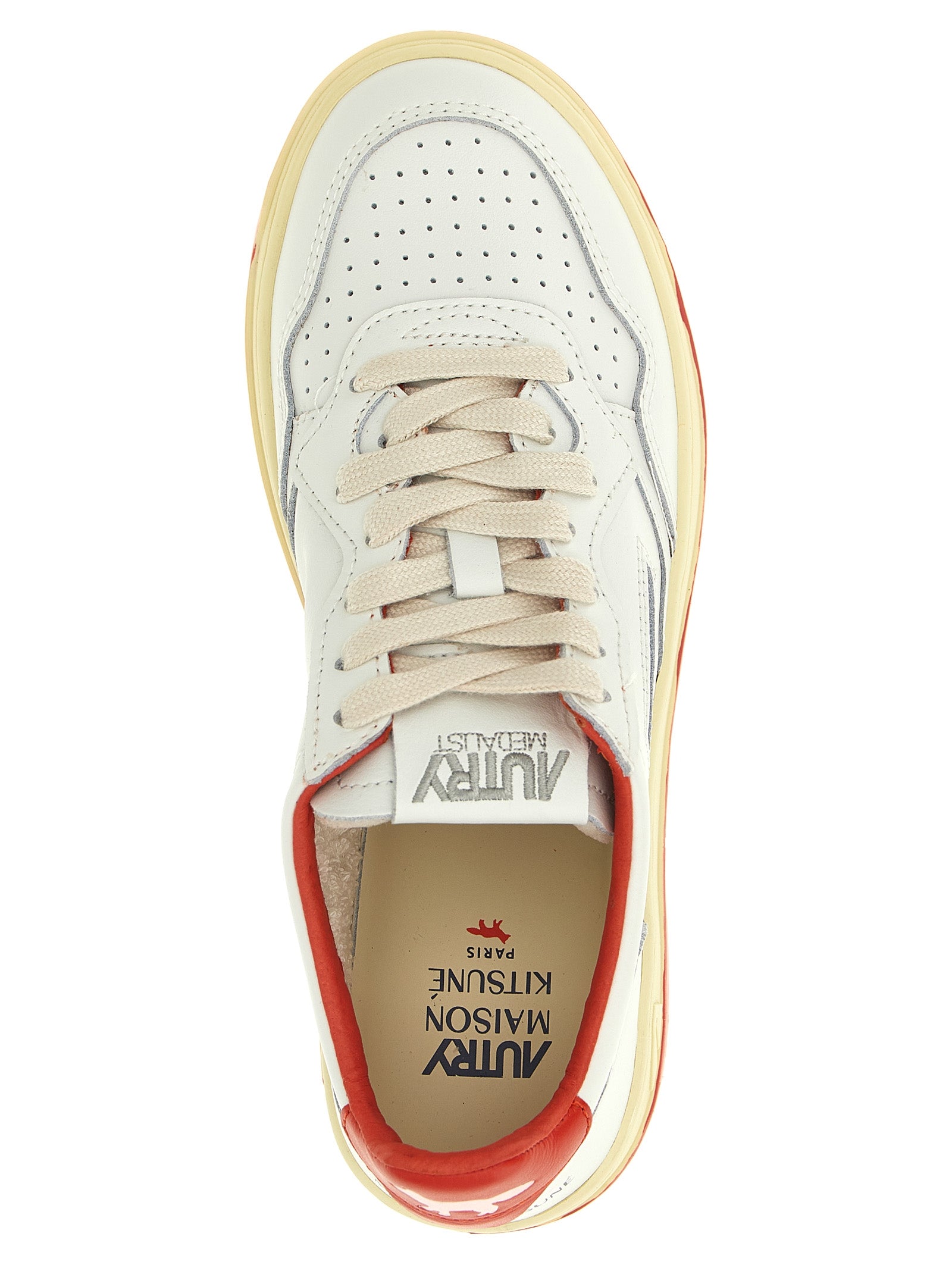 Sneakers by Autry for women in goatskin leather multicolor & red presents a sumptuous silhouette, artfully capturing the essence of the Women's Low Top Goatskin Leather Sneakers with its sumptuous low-top style design.
