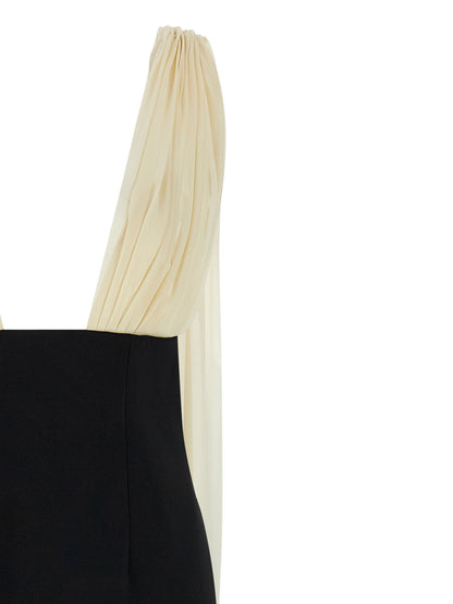 Dress by Armarium for women in virgin wool silk & polyamide bicolour, black, white & patterned features an cute silhouette, detailed with a and v-neck split shawl-collar tube neckline that elegantly flows into a cute long.