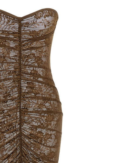 Dress by Norma Kamali for women in stretch polyamide bicolour, green & transparent features an magnificent silhouette, artfully detailed with a magnificent turtle neckline and that flows into an magnificent long.