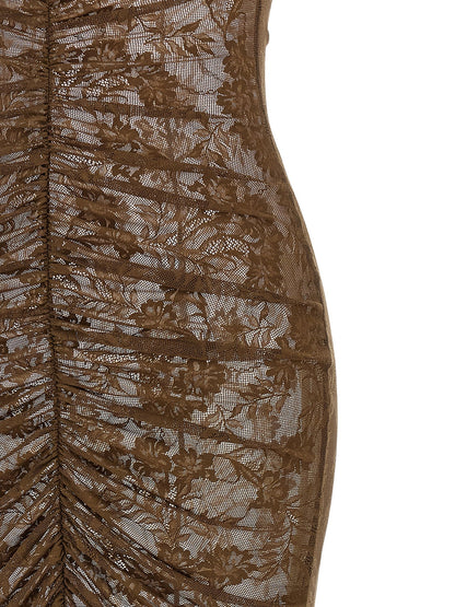 Dress by Norma Kamali for women in stretch polyamide bicolour, green & transparent presents a sinuous silhouette, showcasing a sophisticated and detailed with a sinuous long for a refined finish.